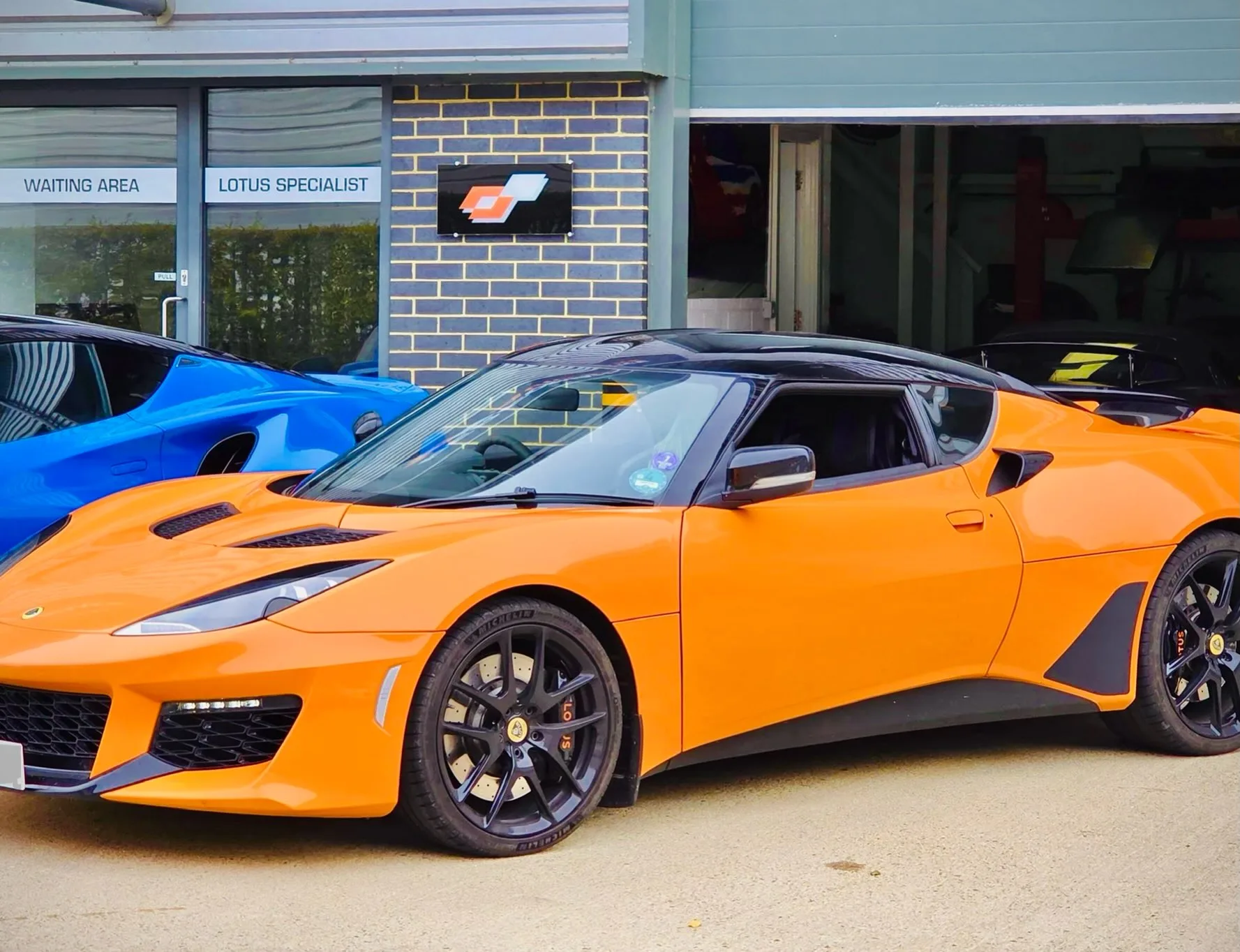 Orange Lotus Evora 400 outside Performance Autocare