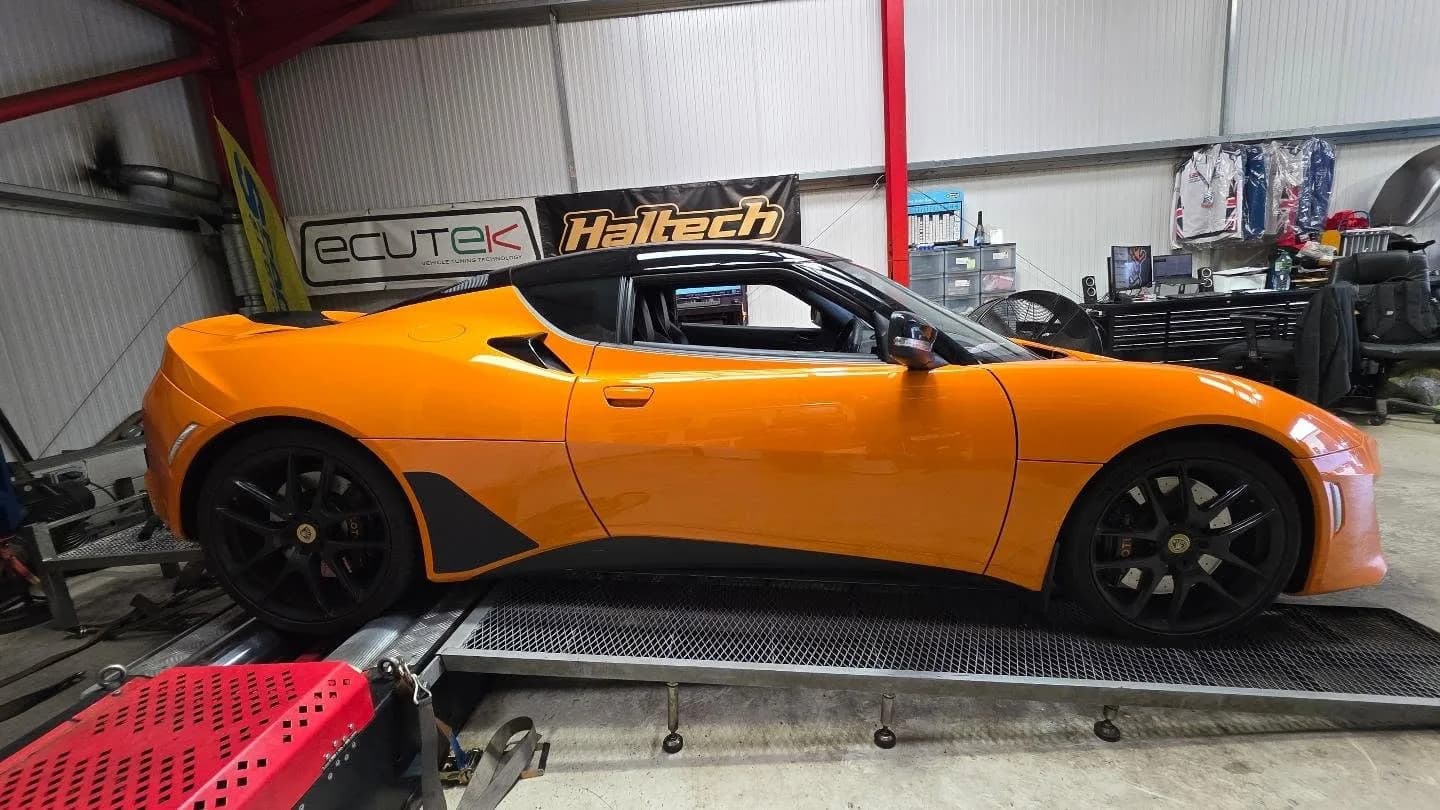 Lotus Evora 400 strapped to the rolling road