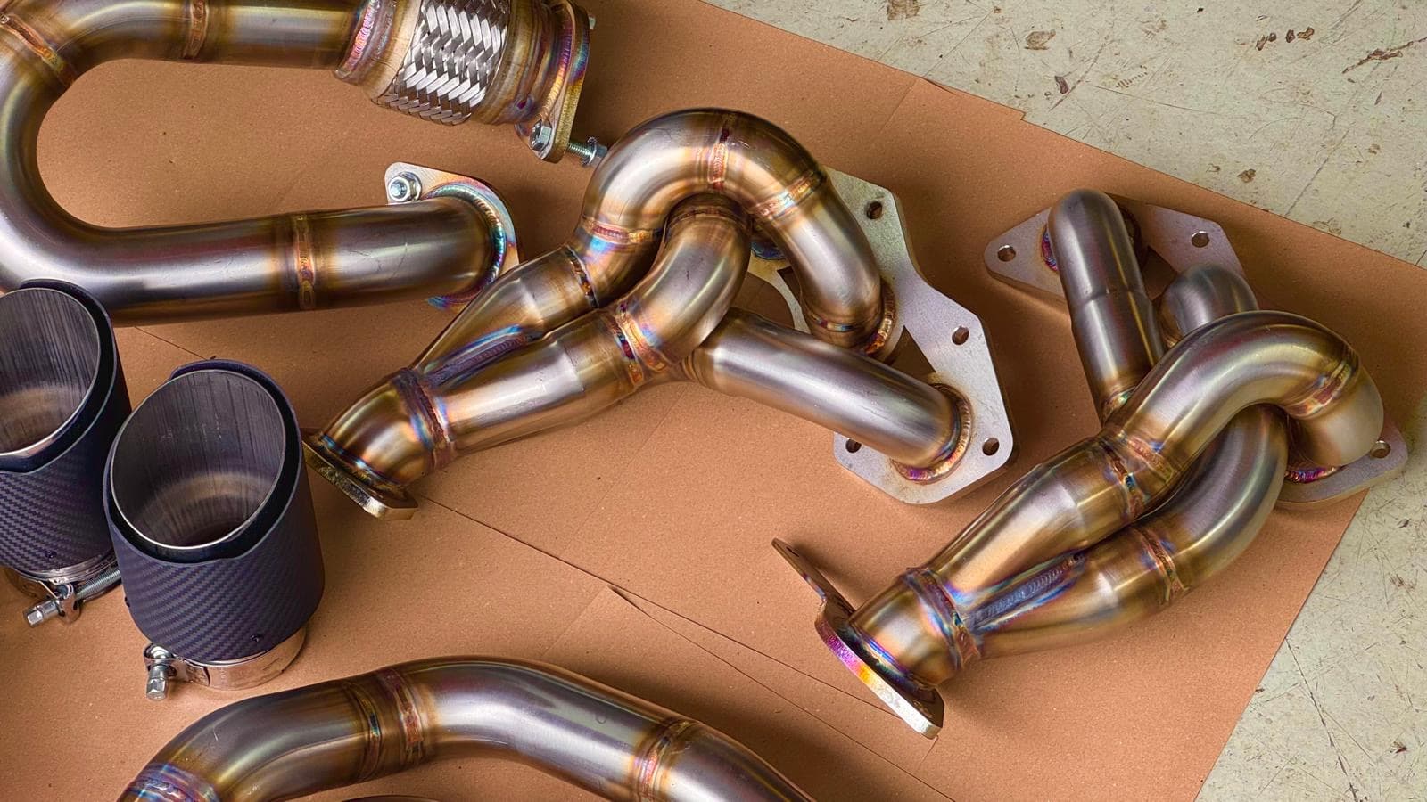 Hand-built stainless steel exhaust component