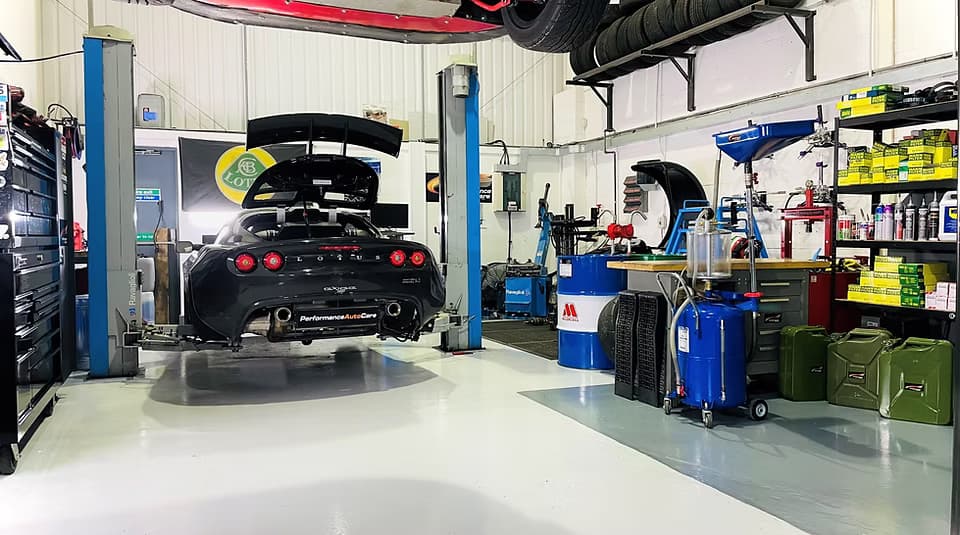 Black Exige in Performance Autocare Workshop